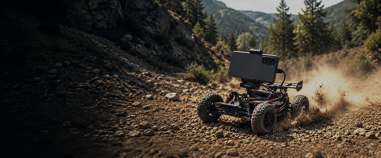 RC car with a mounted Android phone on a mountain dirt trail